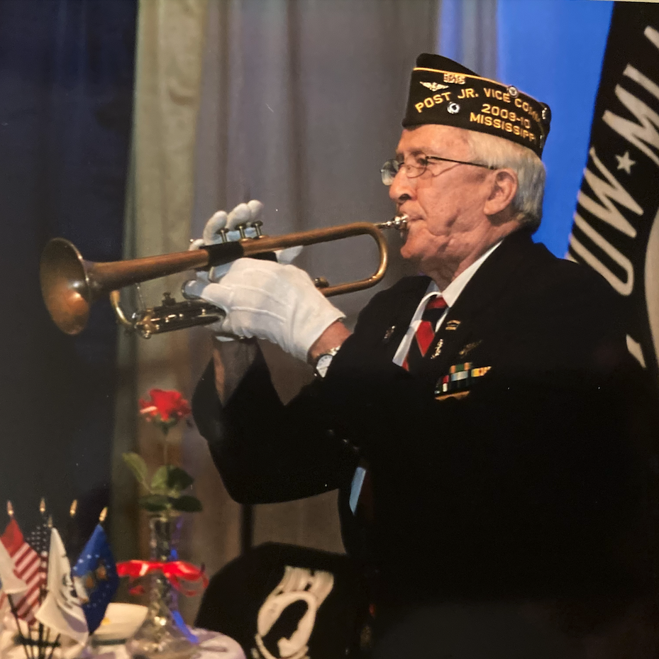 Hal Purvis playing taps  at the 100th anniversary of Camp Shelby, Mississippi. I played taps for all of the military members killed during World War II, Korean and Vietnam wars. 